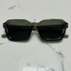 Meller green sunglasses.